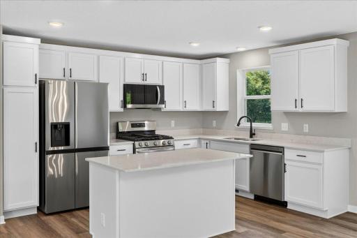 Photo taken of another home with similar plan and finishes.