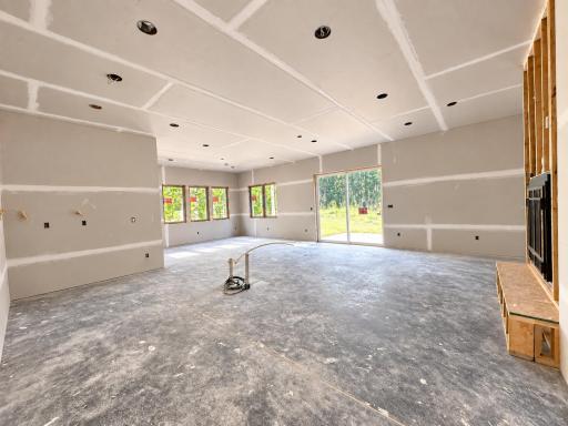 Main floor open living with lots of light and large patio slider