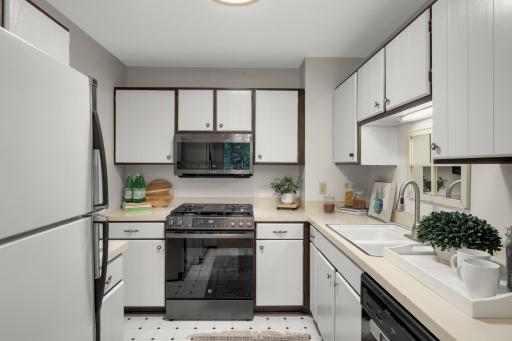 Enjoy a new gas range with griddle and microwave.