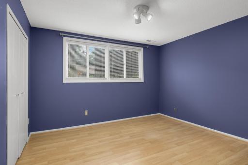 Bedroom two on the lower level faces the front of the home and gets fabulous natural light.