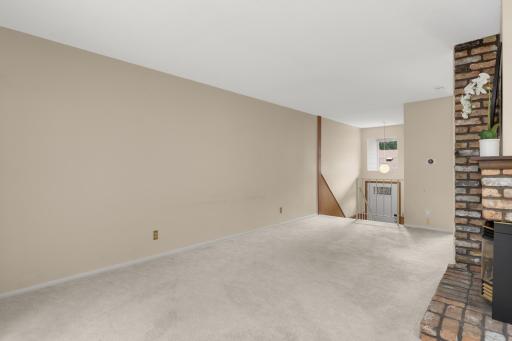 The sunny foyer greets you upon entrance to the home.