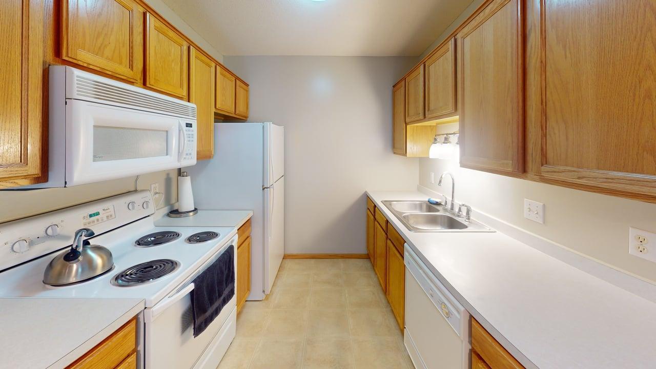 Galley-style kitchen with ample cabinet/countertop space