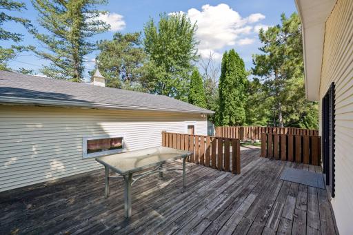 Large deck from back of house to garage