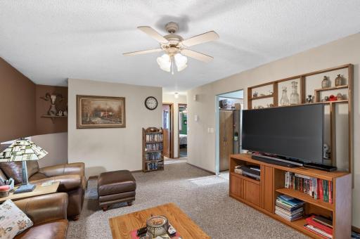 This alternate view of the living room shows just how versatile this space is. It's the perfect area for relaxing or entertaining.