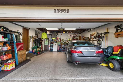 The oversized two car garage offers epoxy coated floors and provides exceptional room for vehicles, tools, and recreational gear.