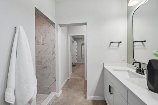 Tiled walk-in shower with 2 shower heads!