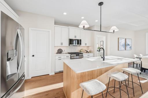 LG stainless steel appliances with gas range.
