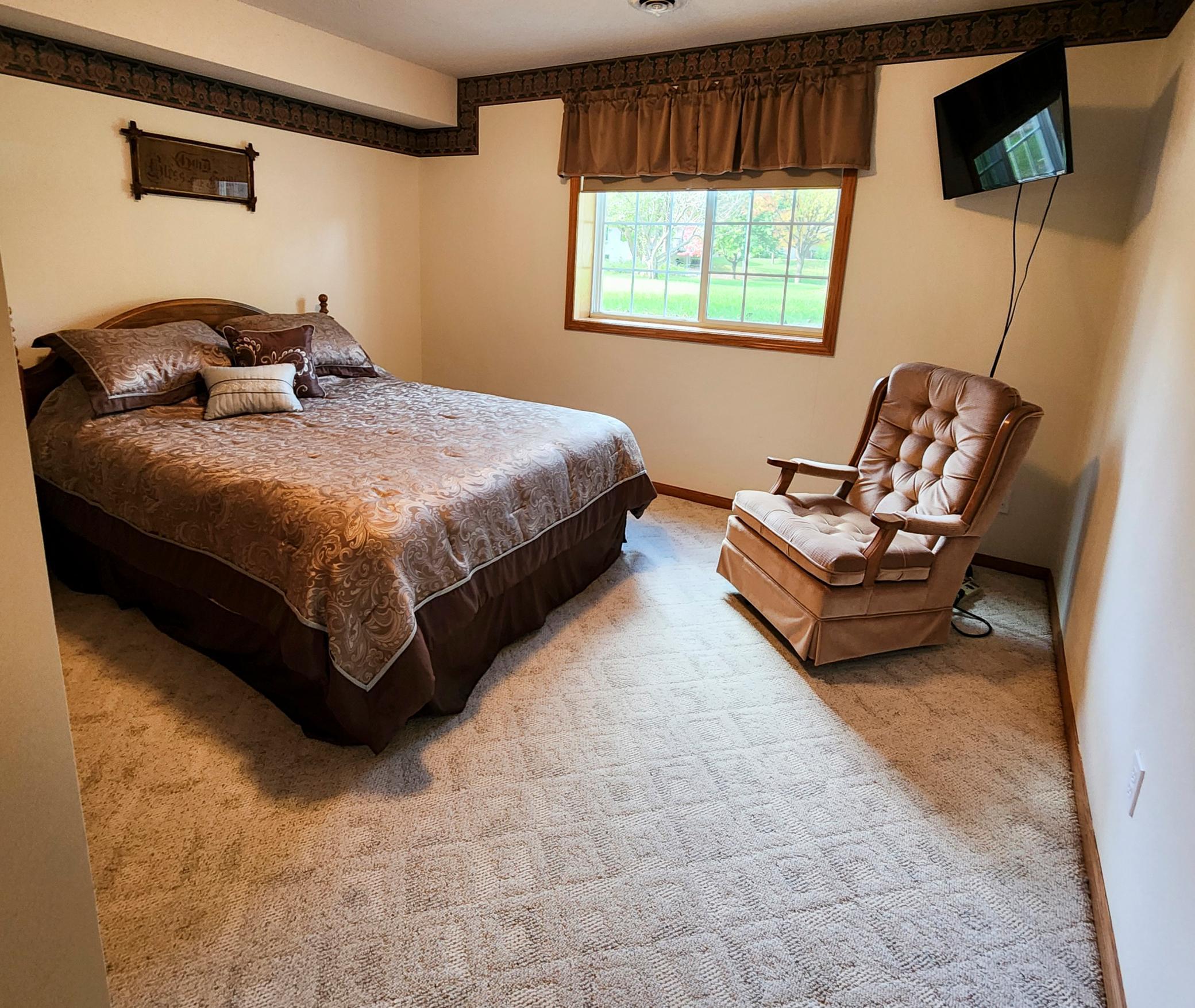 3rd of 3 bedrooms is located in the lower level. With look out windows this doesn't feel like a basement