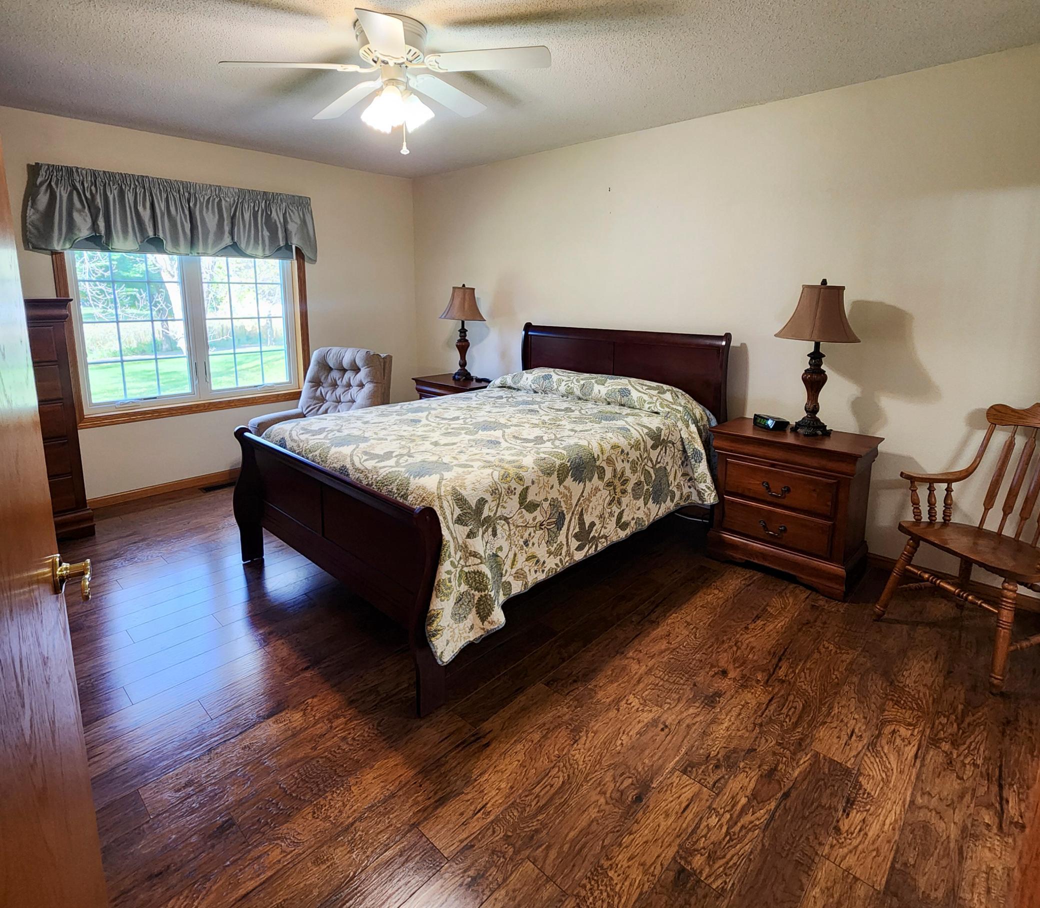 Engineered Hardwood Floors into Primary Bedroom