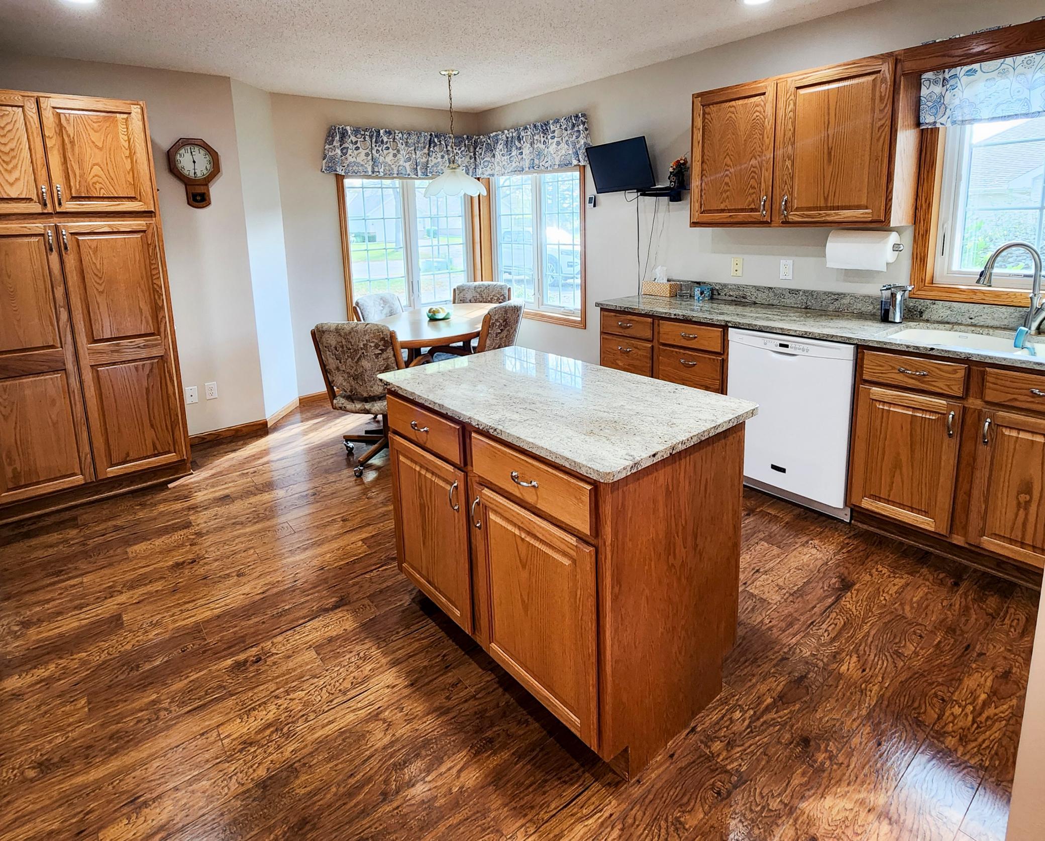 Granite Countertops and New White Stainless Steel Appliances