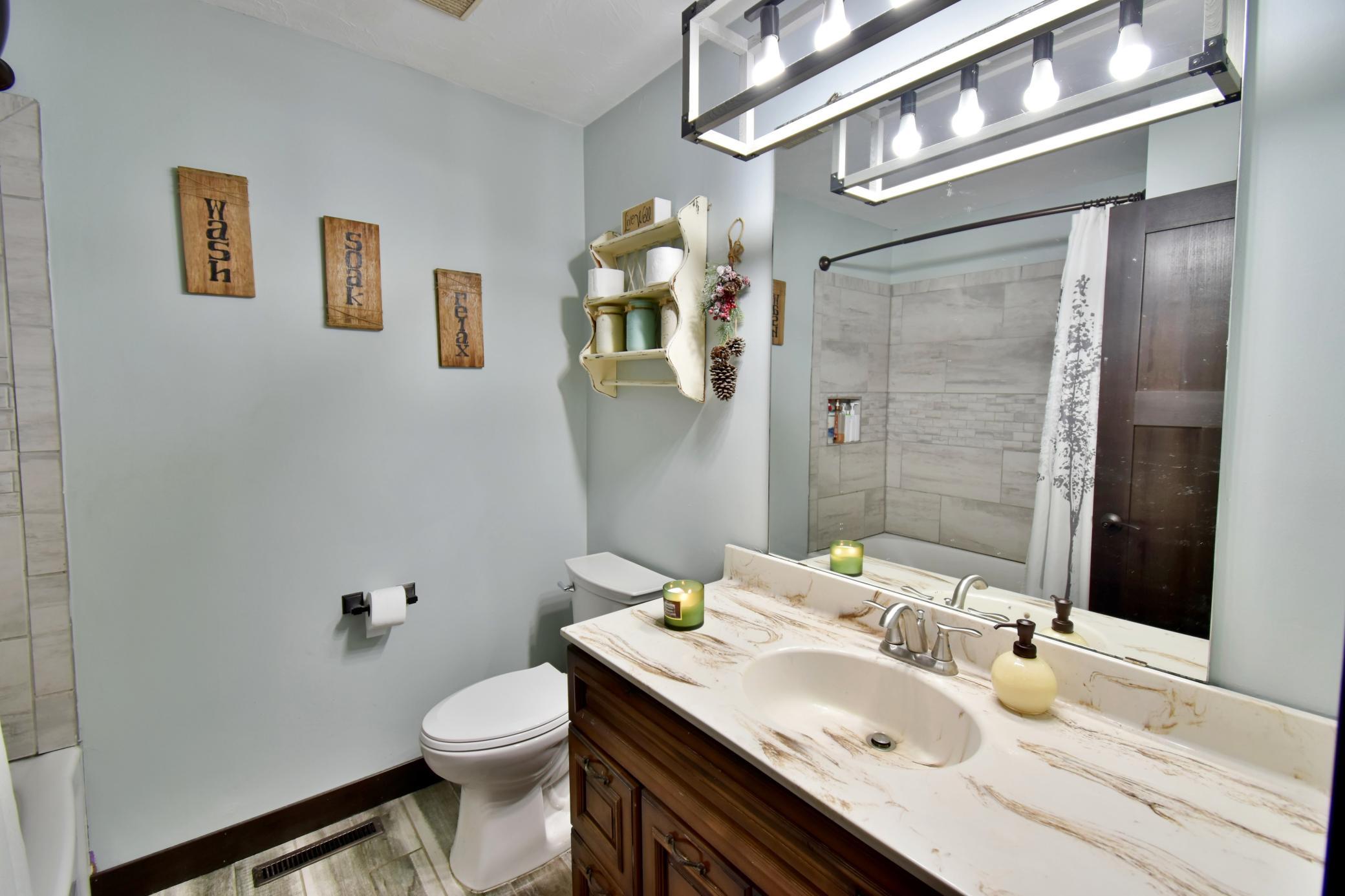 Main level full bathroom has also been completely refreshed!