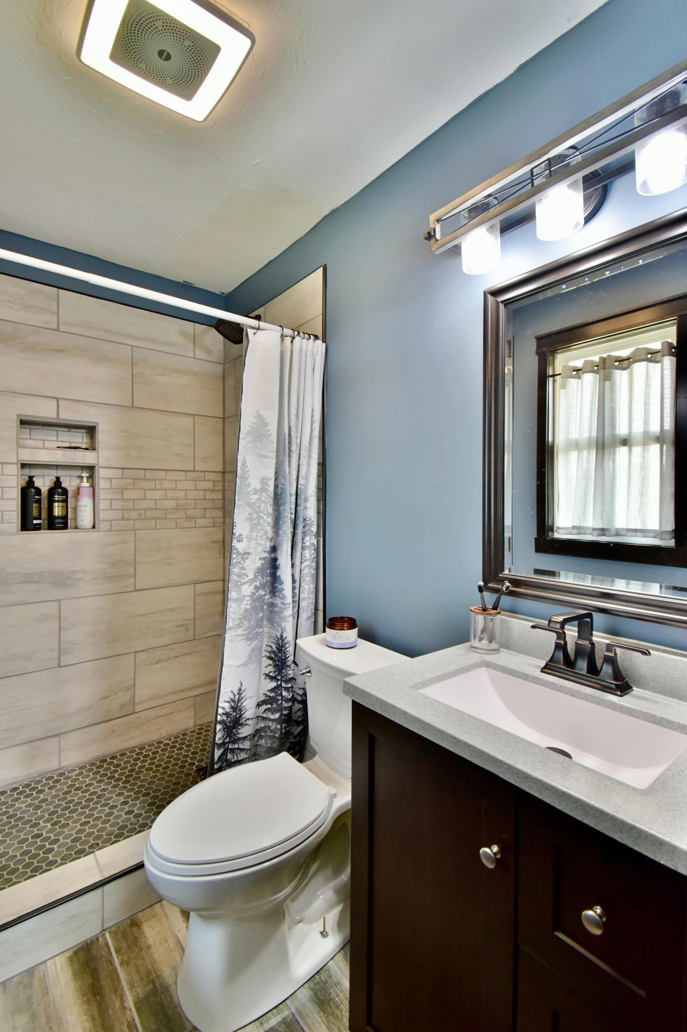 Primary 3/4 bathroom has been completely remodeled with a very modern look!