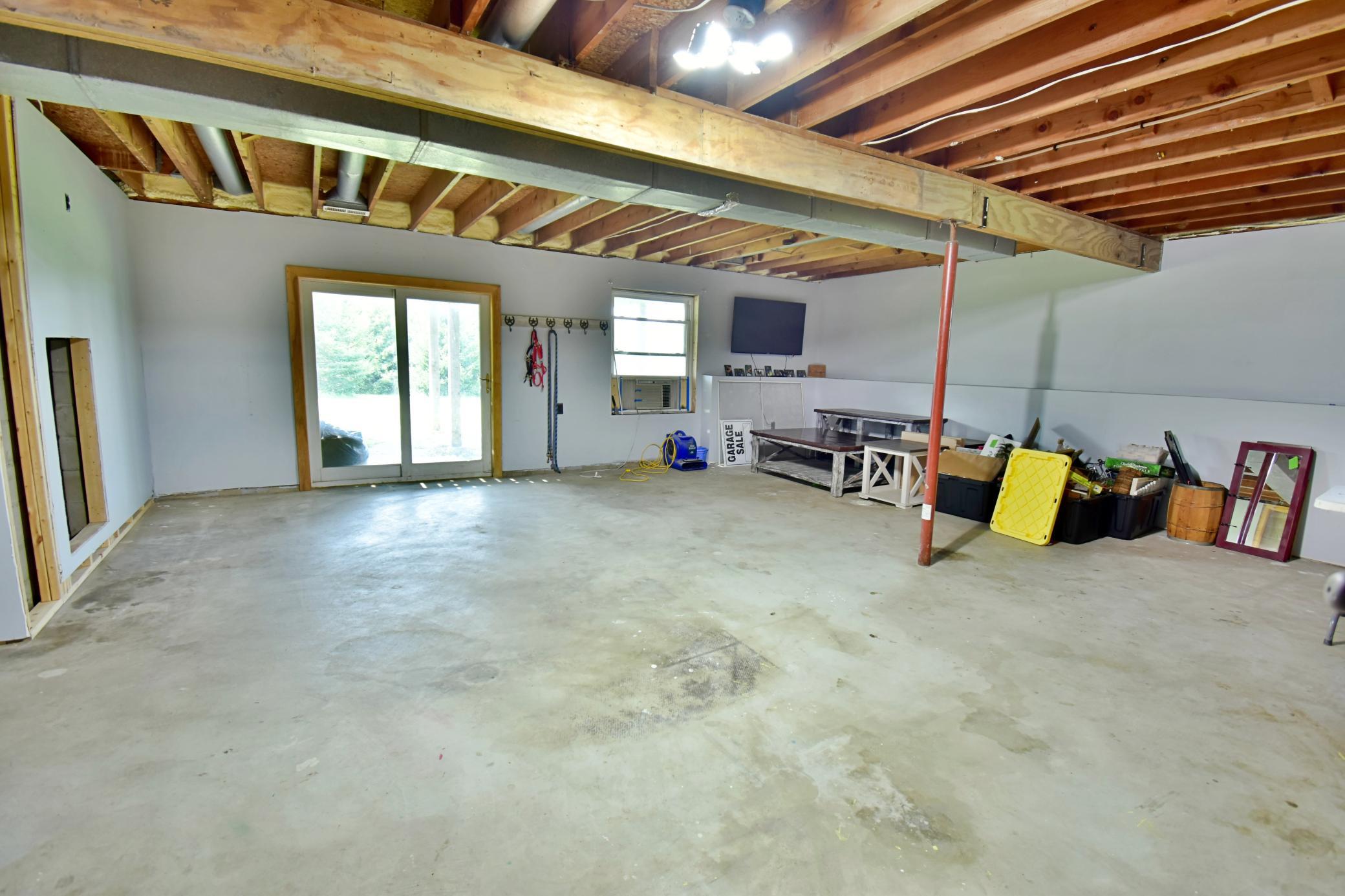 Lower level is a walk-out and has so much potential for finishing and building your own equity