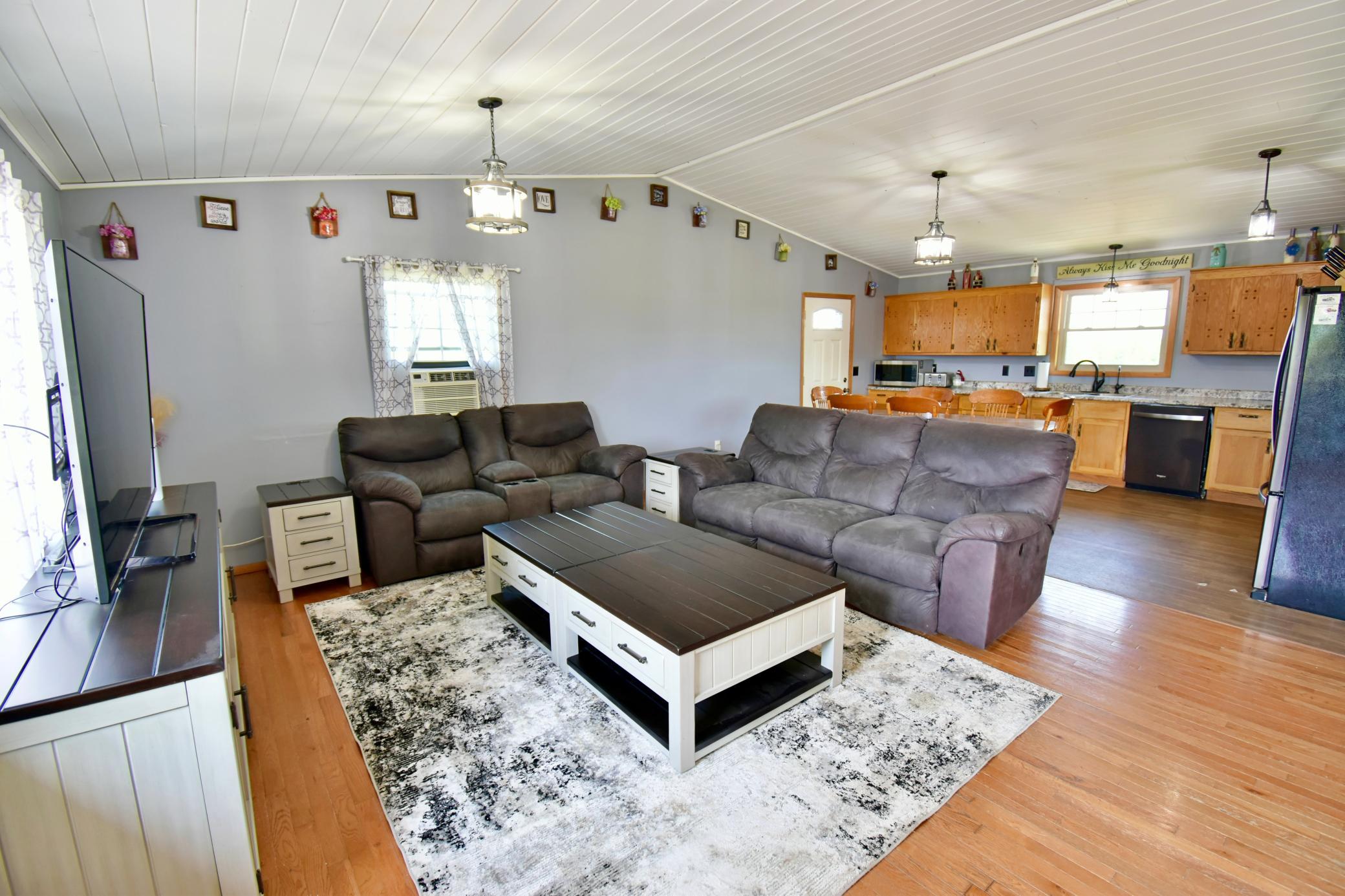Vaulted ceilings in the living room help you feel just how expansive this space really is.