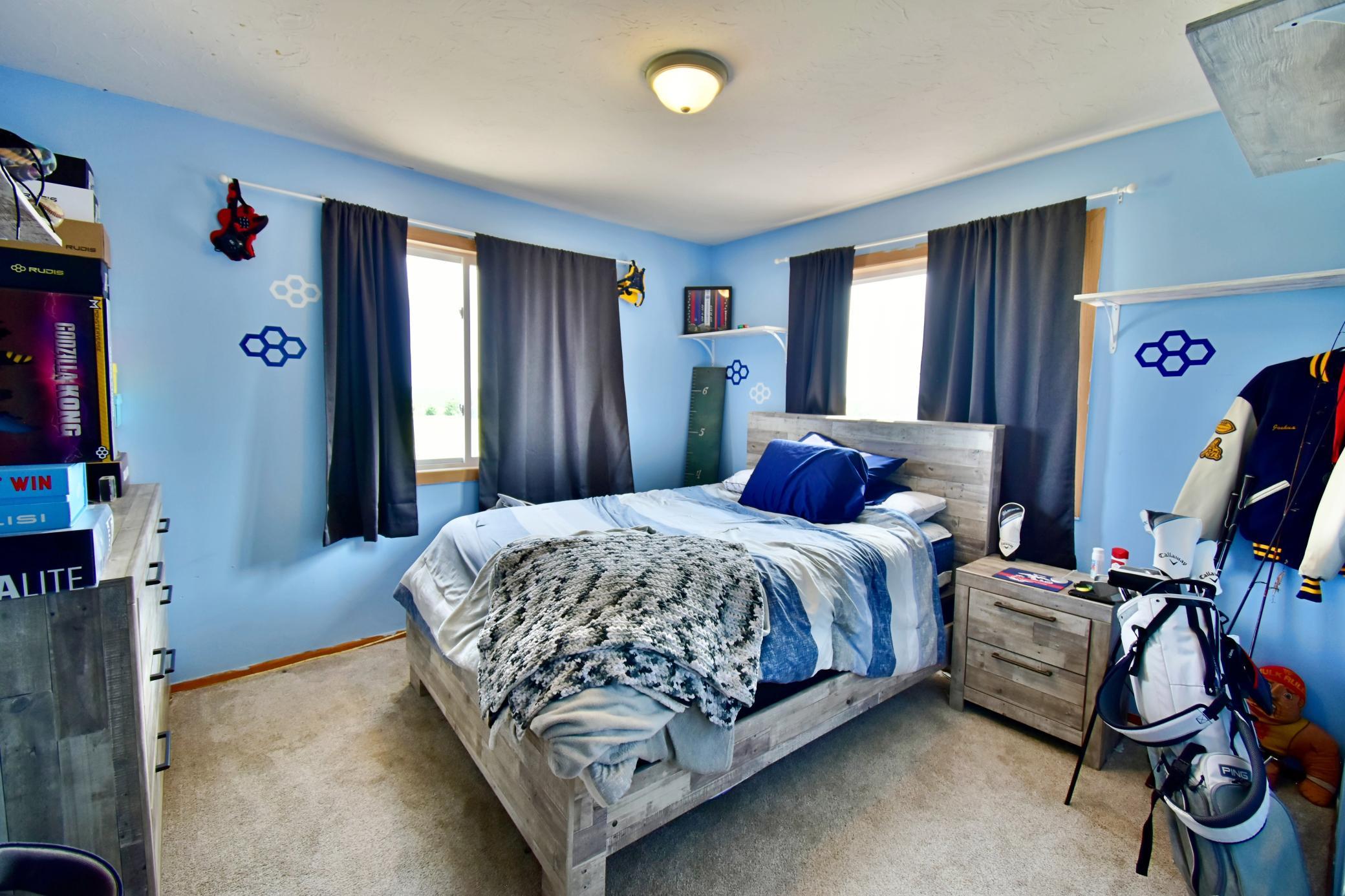 Third bedroom on the main level - two windows for extra light and fresh air!