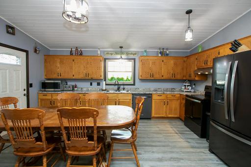 Kitchen floor recently replaced! Open concept area and space big enough for a large table!