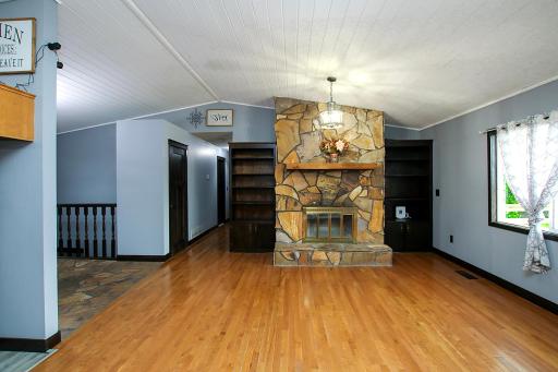 The focal point of the living room area is this large stone fireplace, sure to get used on many Minnesota winter evenings!
