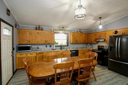 Plenty of cabinets, counter tops and space for family get togethers and entertaining.