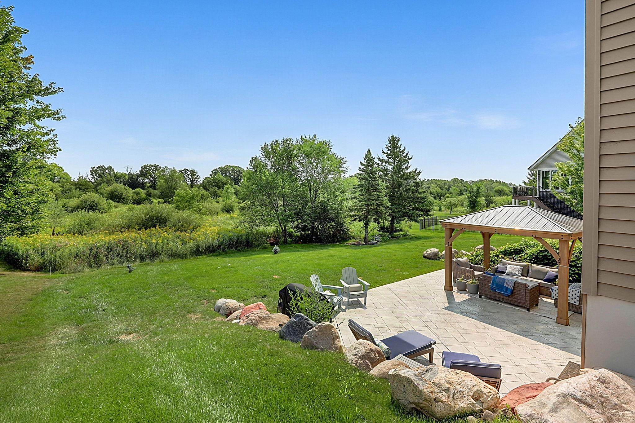 Outdoor patio and private backyard