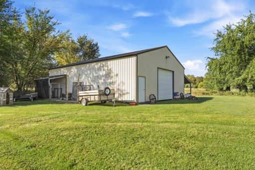 30x40 pole barn with lean too on side currently has a dog door in back for kennel - electric already in pole barn just needs cement floor