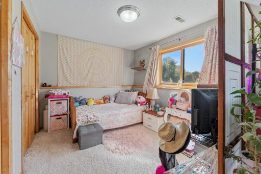 lower bedroom that is currently divided into 2