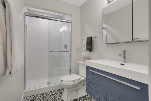 Upper floor bathroom with walk-in shower