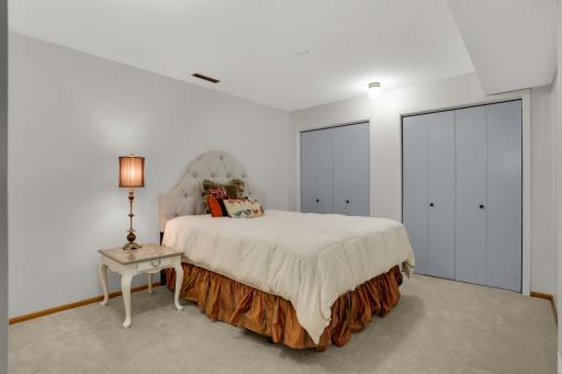 Lower level guest room with double closets