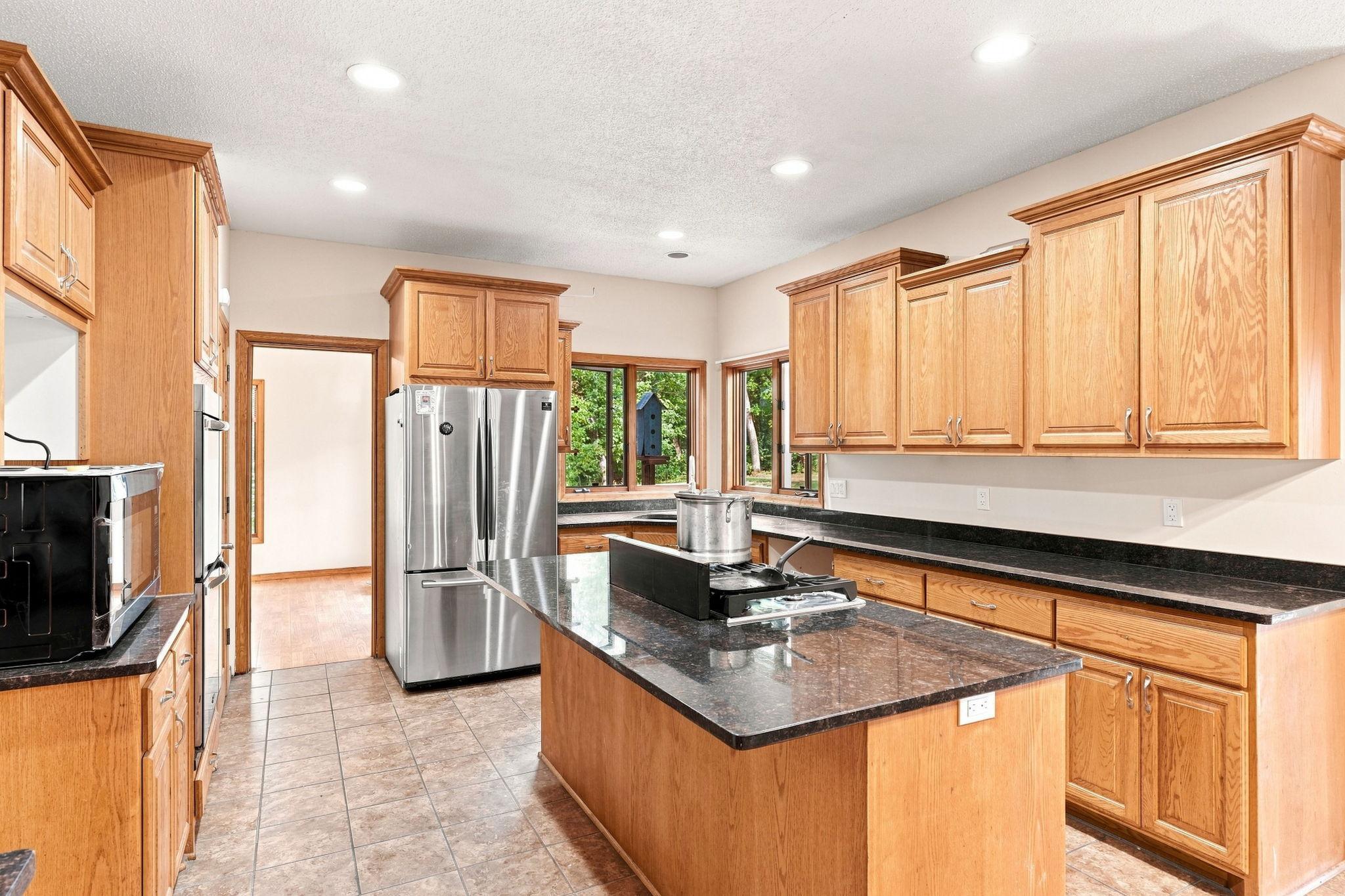 It's complete with double ovens, a pantry, and plenty of storage for effortless organization