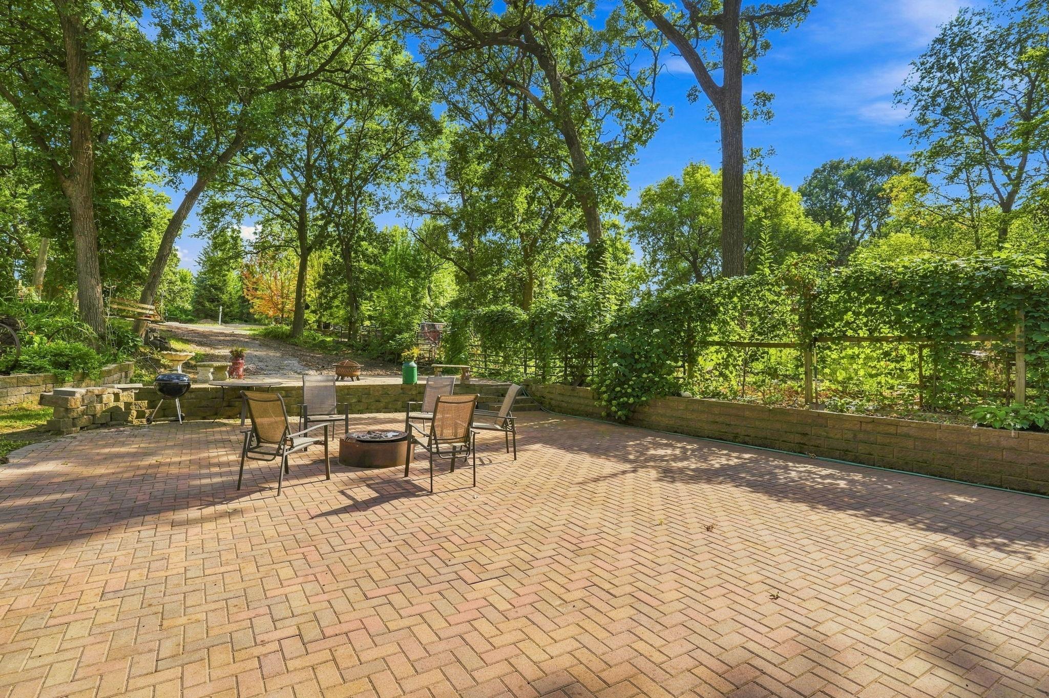 Expansive patio space with attractive landscaping