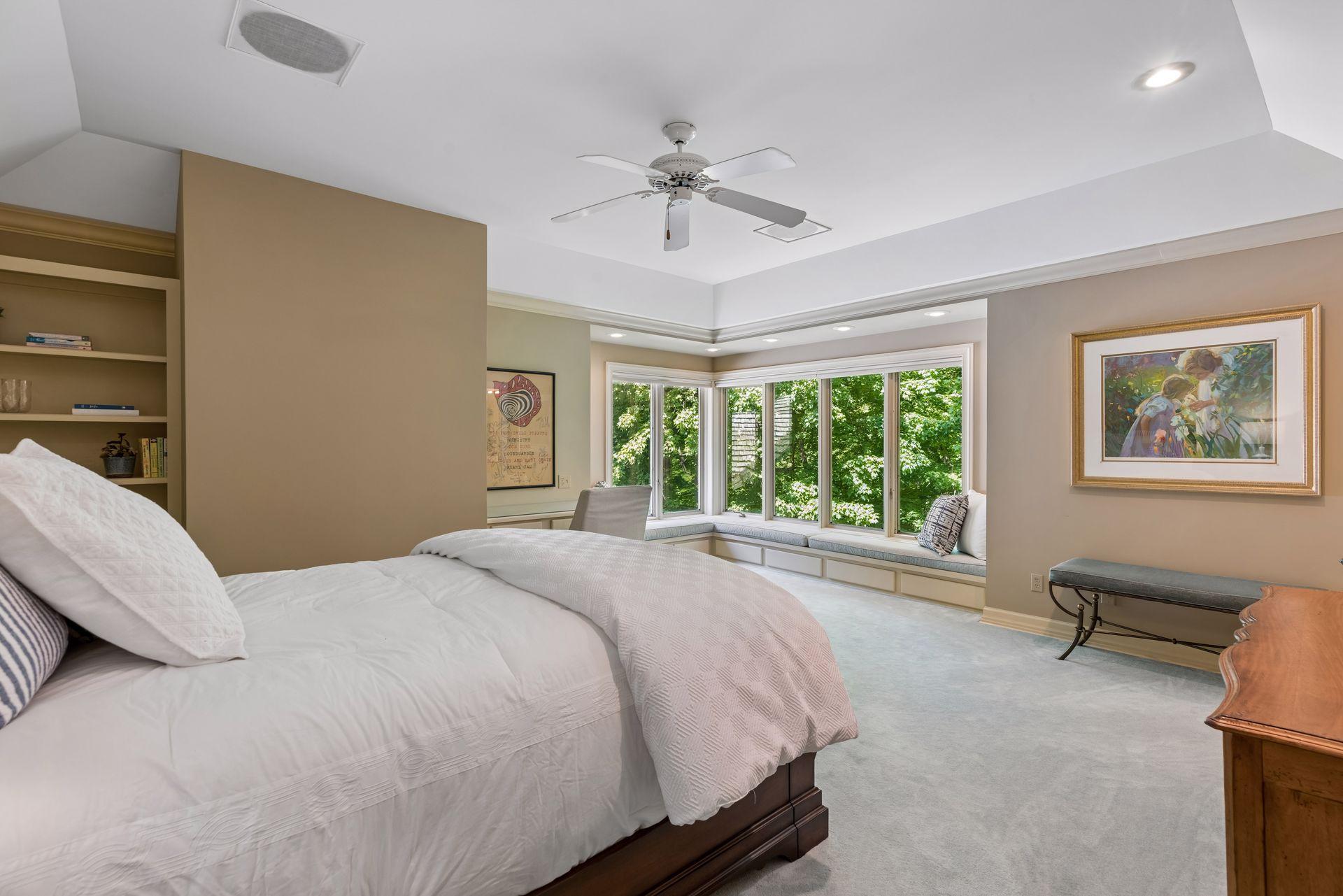 Upper level bedroom with window seat
