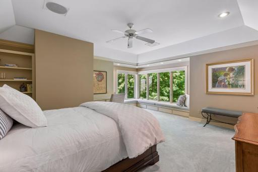 Upper level bedroom with window seat