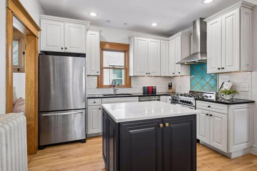 Completely renovated kitchen with custom center island, ample storage and counter space for the chef if your household.