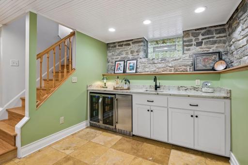 Lower level wet bar awaits for your entertaining fun!