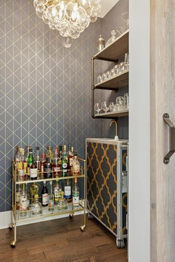 For those who love to entertain, enjoy the flex space just off the foyer. This is currently used as a bar but could be a large walk-in closet, a desk space, or so much more.