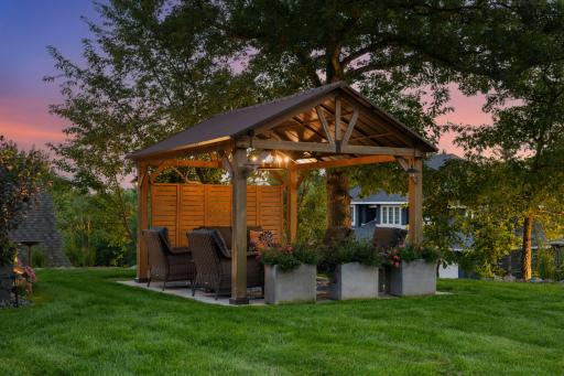 The outdoor gazebo is fully equipped with lighting and TV hookup for enjoying the summer nights to their full potential.