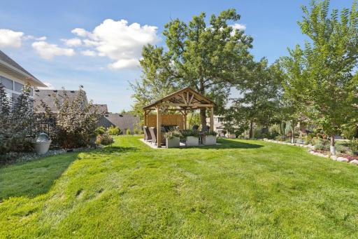 The lovely yard features a fenced in dog run just off the heated garage plus plenty of play space!