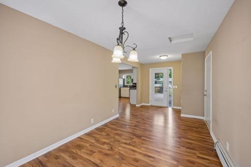 Formal dining room and large back foyer area with entrance and access to the attached two car garage.