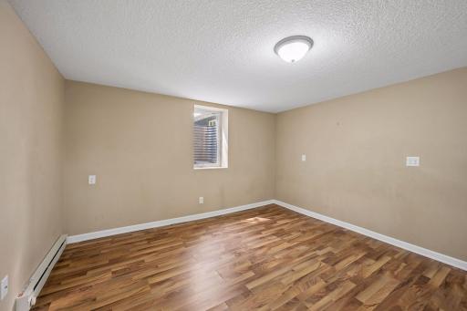 Lower level bedroom with egress window