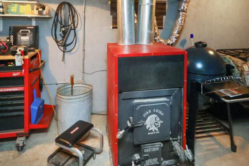 Wood stove back up to heat the home and tuckunder garage.jpg