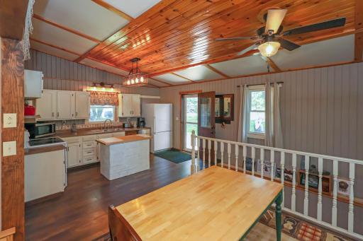 Open kitchen and dining area with vaulted ceilings.jpg