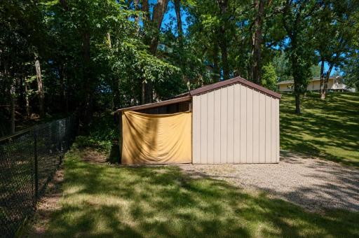 Additional storage shed has a lean-to off the back.jpg