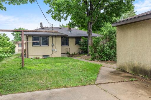 The fully fenced backyard offers plenty of space to spread out, play, entertain, or simply enjoy the outdoors.