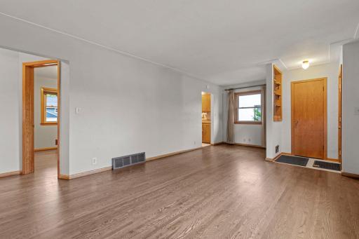 The living room offers a versatile layout with endless possibilities to make the space your own.