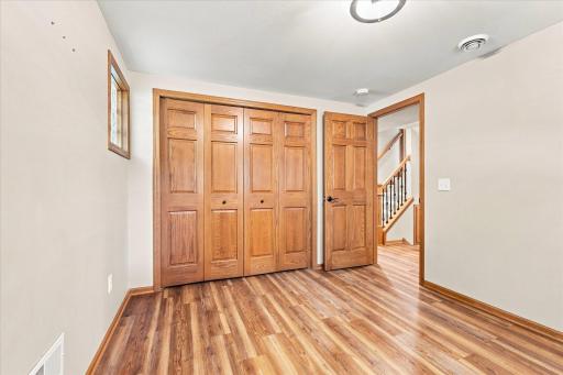 Bedroom 3 on the lower level features new flooring windows and a huge closet.