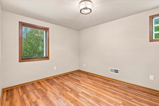 BR 3 is adjacent to teh LL 3/4 bath and has a large window overlooking the back yard