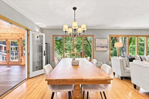 From the kitchen you have easy access to the dining room overlooking the extraordinary back yard