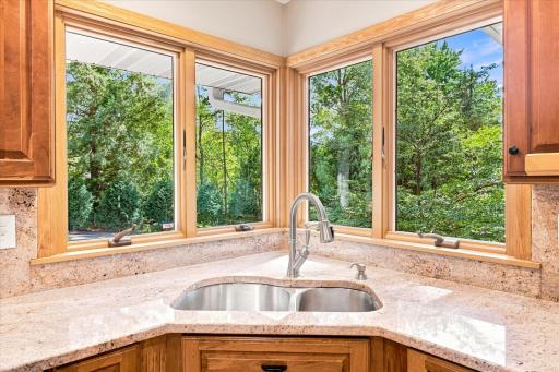 The corner dual under mount stainless sink offers a stunning view year round.