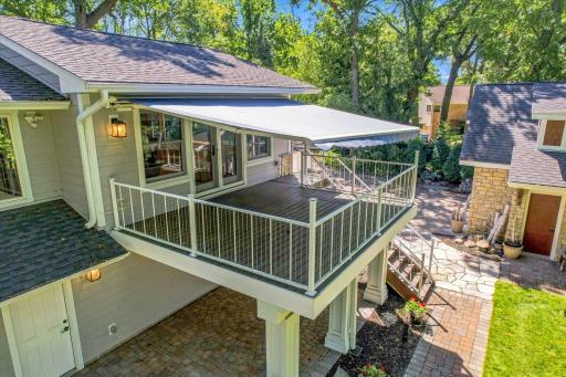 The Sunbrella awning features a remote control and under awning lights!