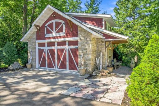 CHARMING 23'x28' garage with loft is the most charming you will ever see! Custom built in 2021.