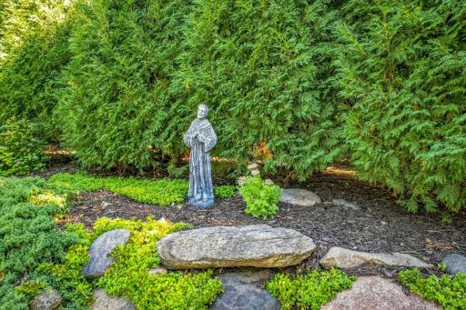 St. Francis looks over the little animals in the gardens.